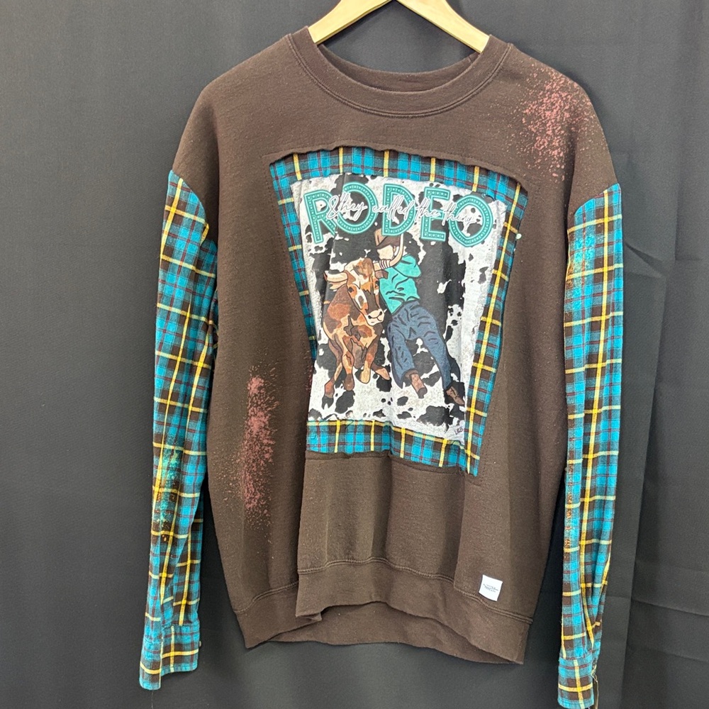Brown Rodeo Graphic Sweater with Plaid Sleeves Repurposed by “Jagged Threads”